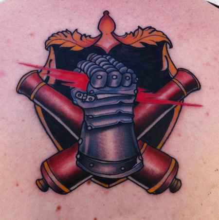 Mike Riedl - traditional color armor fist with shield tattoo. Art Junkies Tattoos Mike Riedl